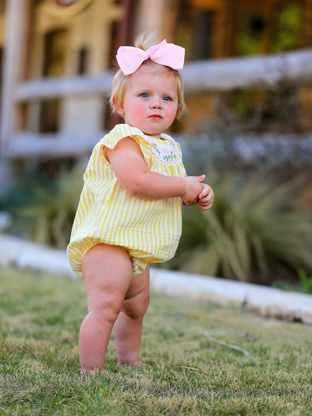 Close-up of Spring/Summer Chick Floral Embroidery Smocking Girls Romper highlighting the intricate embroidery and soft cotton fabric.