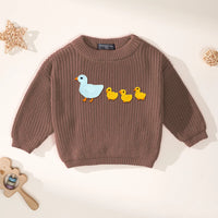 Mocha brown baby sweater with blue mother and yellow chicks embroidery against white background