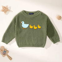 Forest green chunky knit sweater with blue mother duck and yellow ducklings embroidery on white background