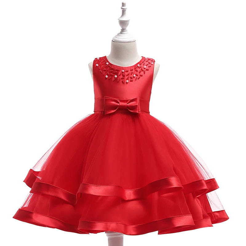 Sacha Marie Elegant Tiered Special Occasion Dress in vibrant red, featuring a beautifully tiered skirt, embellished neckline, and a chic bow.