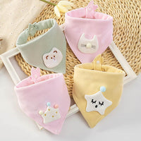 Soft cotton triangle baby bibs in pastel colors featuring cute appliqués of a bear, cat, crown, and star for feeding.