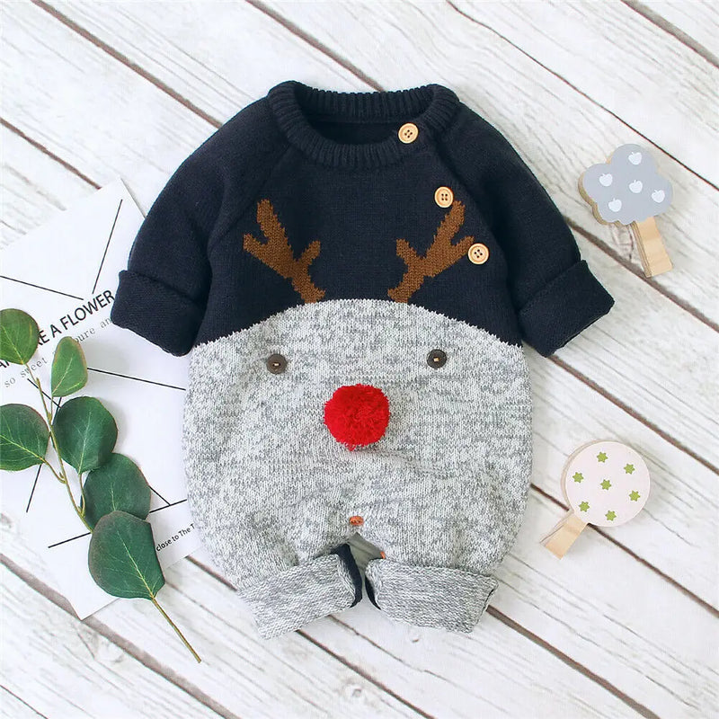 Rudy Reindeer Knit Children's Winter Romper in navy and grey, featuring a festive reindeer design for children.