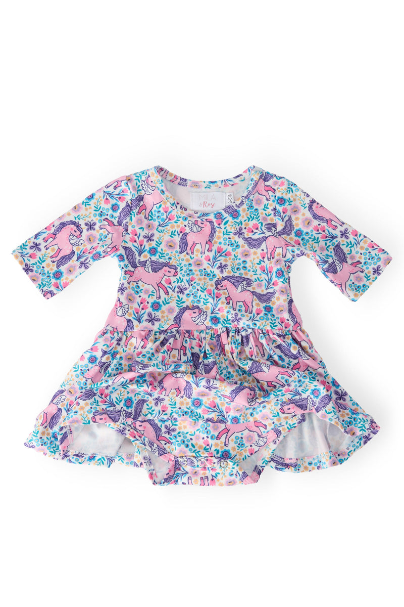 Head in the Clouds 3/4 Sleeve Twirl Bodysuit showcasing a vibrant unicorn pattern, designed for fun and ease, making diaper changes a breeze for busy parents.