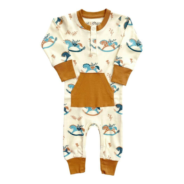 GOTS certified organic cotton playsuit featuring a rocking horse print, camel trim, and front pocket.