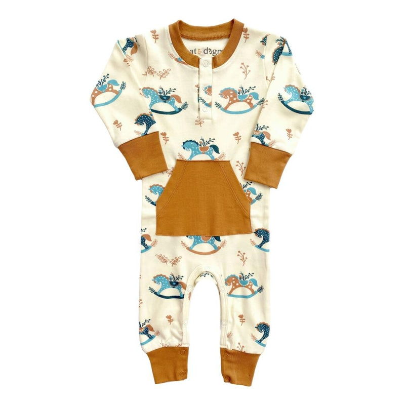 GOTS certified organic cotton playsuit featuring a rocking horse print, camel trim, and front pocket.