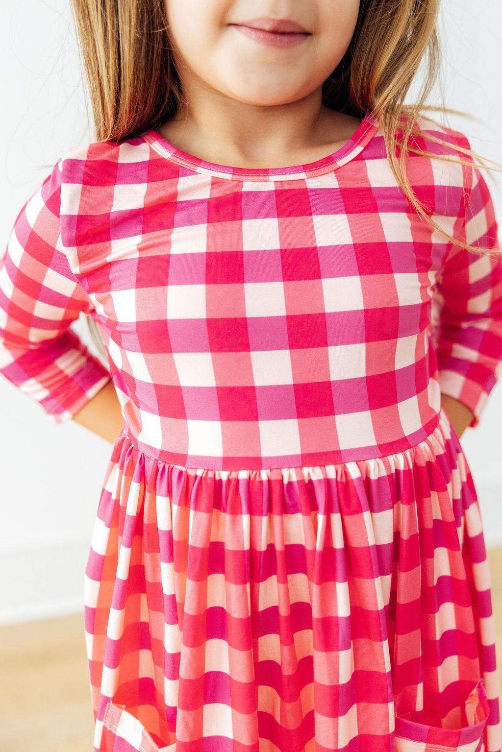 Charming Hot Pink Gingham 3/4 Sleeve Pocket Twirl Dress with Pockets for Girls, ideal for everyday adventures and special occasions, showcases a twirl dress with pockets.