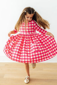 Hot Pink Gingham 3/4 Sleeve Pocket Twirl Dress with Pockets for Girls, a playful twirl dress with pockets, perfect for school and play.