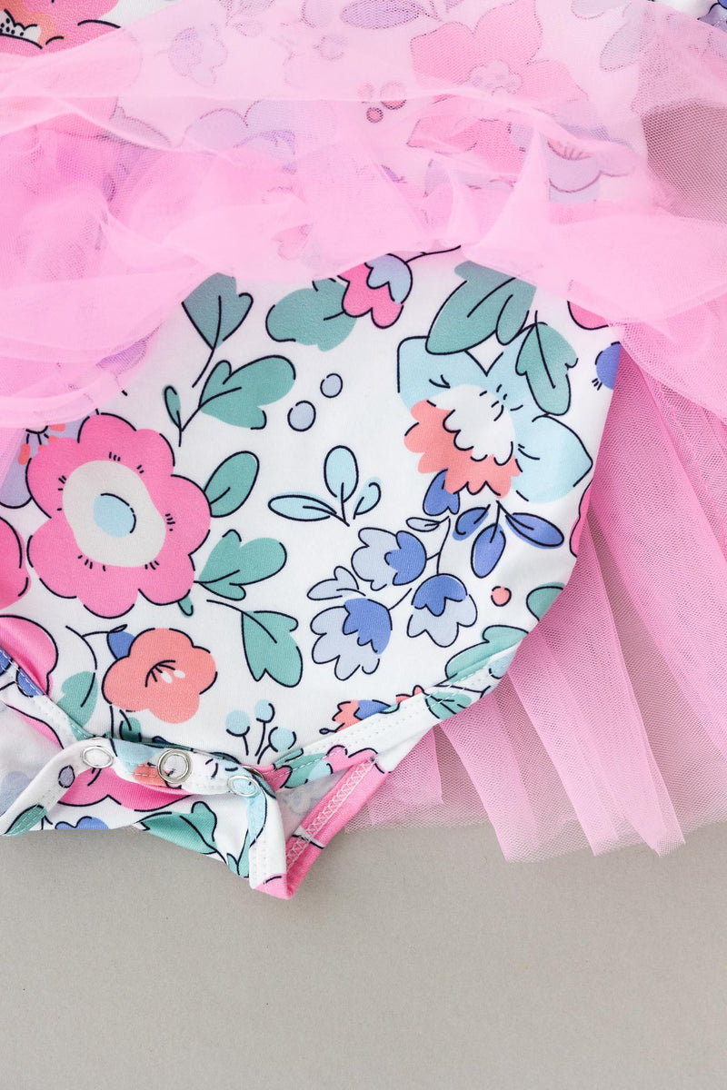 Close-up view of the Hydrangea Tutu Bodysuit showcasing the floral design and snap closure for easy diaper changes.