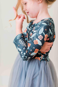 Girls long sleeve tutu dress with floral print bodice and grey tulle skirt. Perfect for play or special occasions.