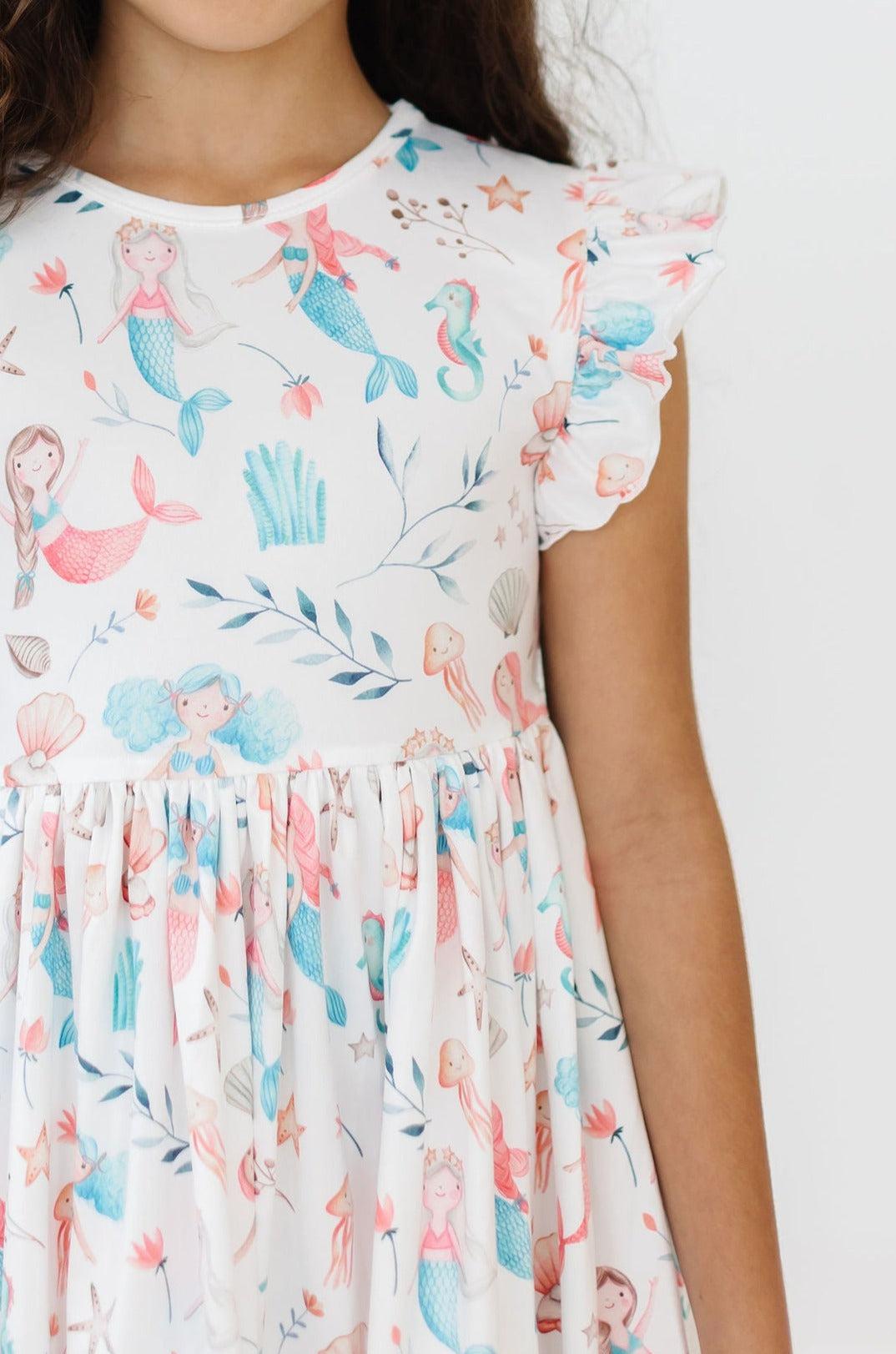 Mermaid Friends Flutter Sleeve Twirl Dress: white mermaid print, flutter sleeves, twirl skirt, comfy and easy-care.