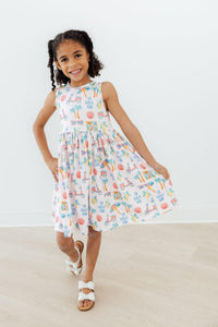 Back view of the Sweet La Dolce Vita Summer Tank Twirl Dress for Girls highlighting the cute neckline and twirl-ready skirt.
