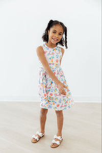 Close-up of the fabric of the Sweet La Dolce Vita Summer Tank Twirl Dress for Girls illustrating its premium texture.