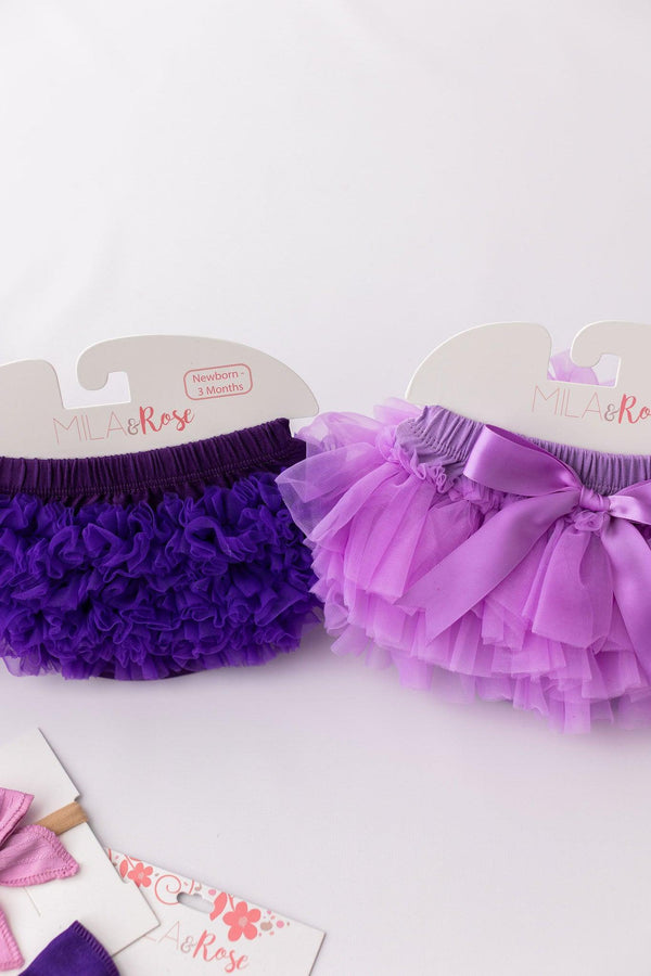 Set of Lavender Ruffle Tutu Bloomers in purple shades by Mila & Rose®, featuring adorable ruffles and bows, ideal for newborns.