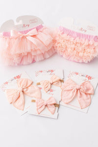 Light Pink Ruffle Tutu Bloomer by Mila & Rose, accompanied by matching pastel headbands, ideal for coordinating outfits for special occasions.