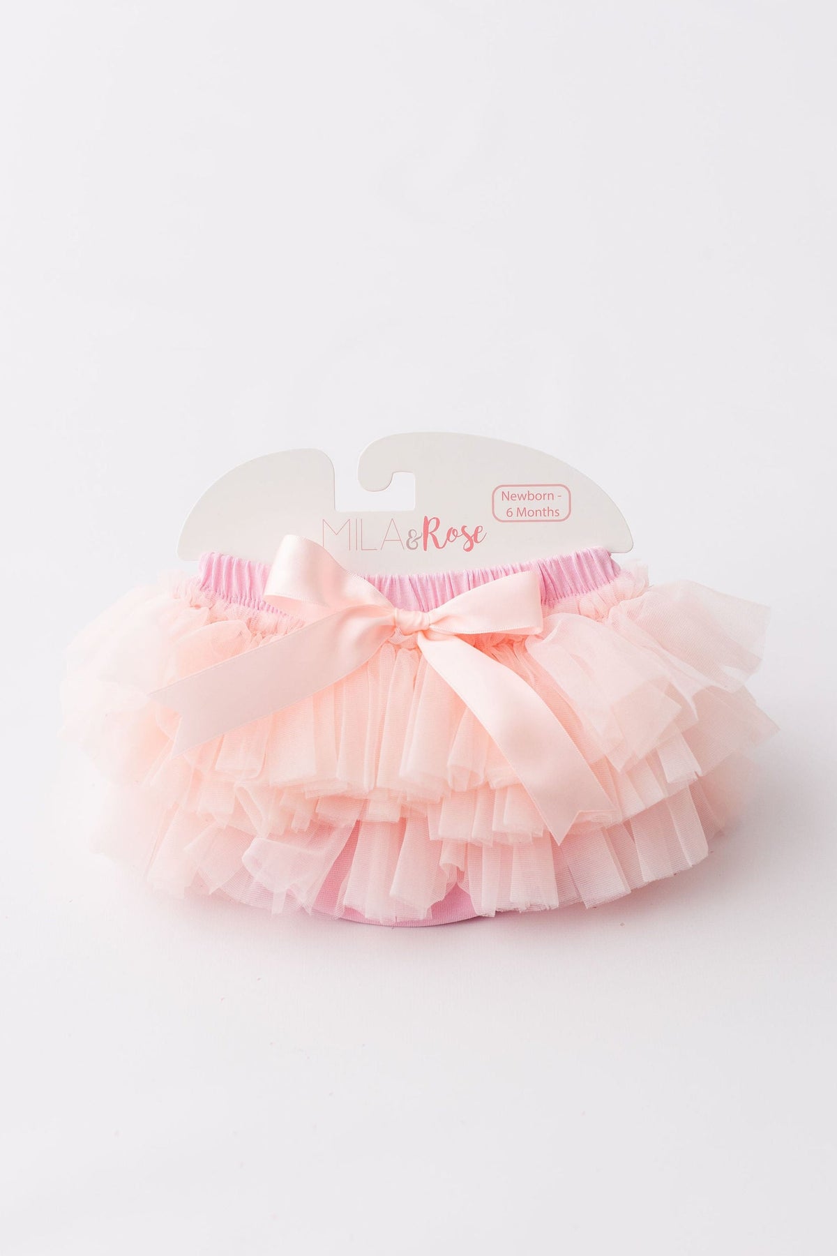 Light Pink Ruffle Tutu Bloomer by Mila & Rose, featuring soft ruffles and a satin bow, perfect for newborn photos and beach outings.