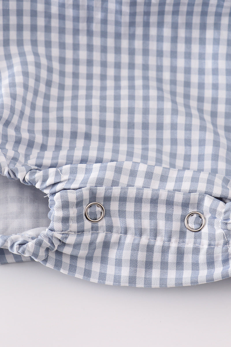 Blue woven check bubble romper leg with metal grommets. Perfect fall boy outfit detail.