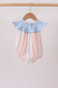 Pastel striped bubble romper with ruffled light blue collar hanging on wooden hanger. Casual coastal-inspired baby outfit.