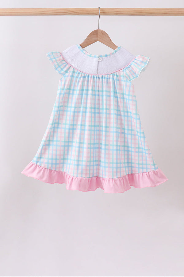 Pink Crocodile Smocked Gingham Dress in pastel pink and blue gingham, smocked bodice, flutter sleeves, pink ruffle hem.