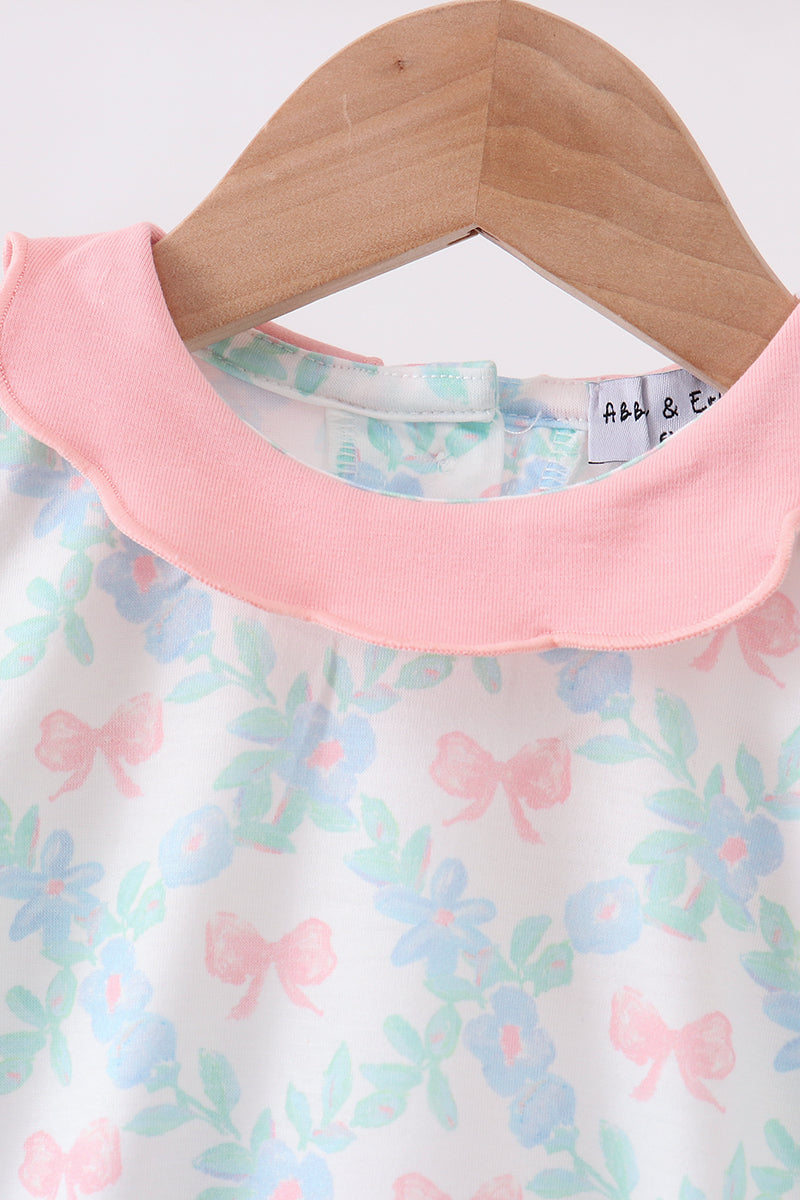 Pink Floral Bow Print Bubble top with pastel flowers and pink collar; 50% cotton, 50% spandex blend.