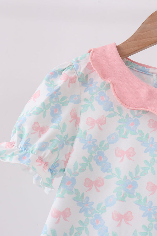 Pink Floral Bow Print Dress with pink ribbed collar and puff sleeves.