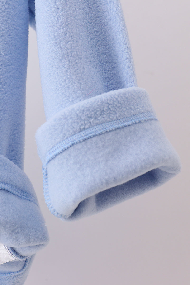 Soft coastal blue fleece coat sleeve with rolled cuff and neat stitching, perfect for toddler warmth and comfort.