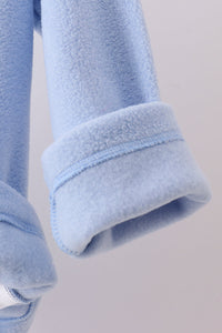 Soft coastal blue fleece coat sleeve with rolled cuff and neat stitching, perfect for toddler warmth and comfort.