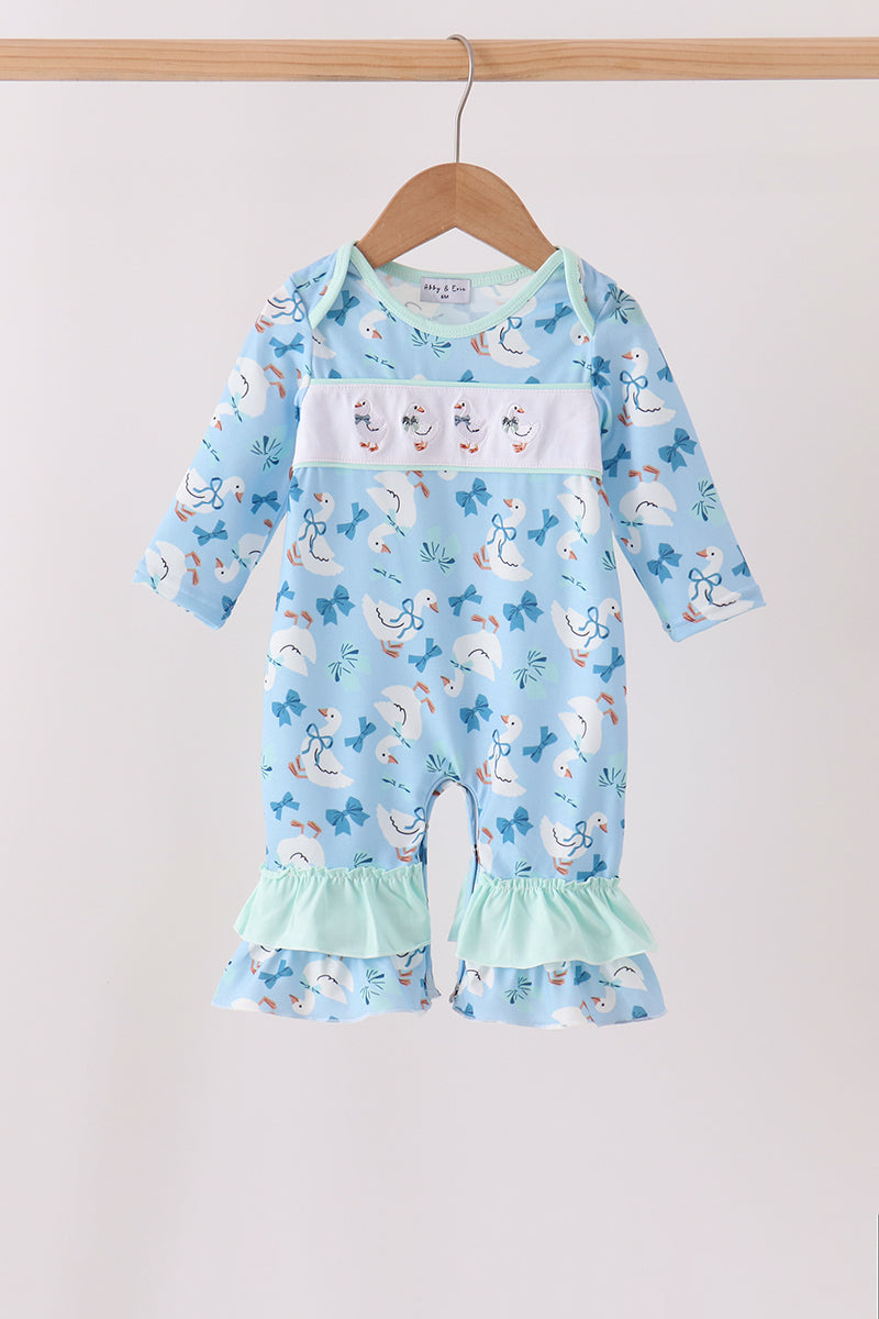 Blue baby romper with goose print, embroidered chest details, bow accents, and mint ruffle leg trim. Soft, comfortable one-piece outfit.