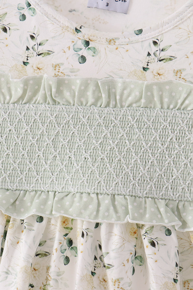 Sage floral two-piece set with smocked waistband, white diamond stitching, and delicate polka dot ruffle trim.