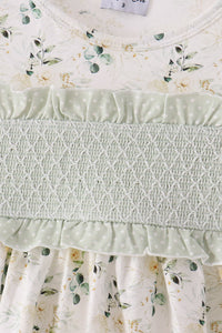 Sage floral two-piece set with smocked waistband, white diamond stitching, and delicate polka dot ruffle trim.