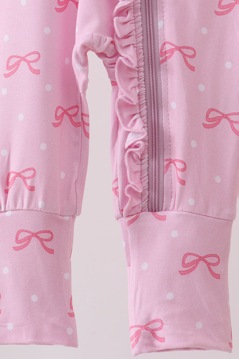 Pink bow print bamboo romper with ruffled side zipper and white polka dots for baby girls