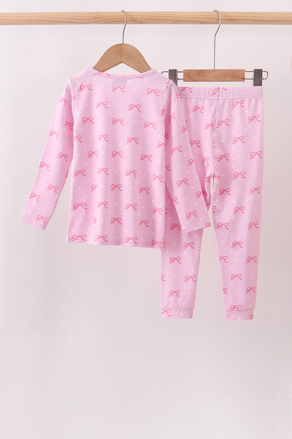 Pink bow print kids clothing set with long sleeve top and pants featuring soft, comfortable fabric for playful daily wear.