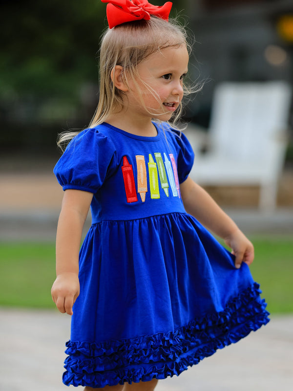 Colorful Girls Back To School Crayon Twirl Dress showcasing fun ruffle details, ideal girls back to school dress for twirling.