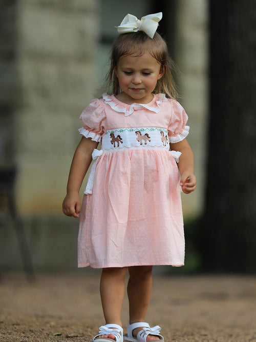 Pink girls dress with puff sleeves, lace collar, and Western horse embroidery on smocked bodice