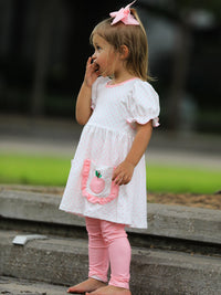 The cozy pockets of the Back To School Girls' Apple Applique Set designed for little treasures like snacks and toys.