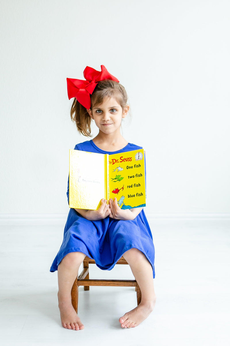 Delightful twirl factor of the Royal Blue 3/4 Sleeve Pocket Twirl Dress by Mila & Rose, ideal for active kids ready to spin with joy.