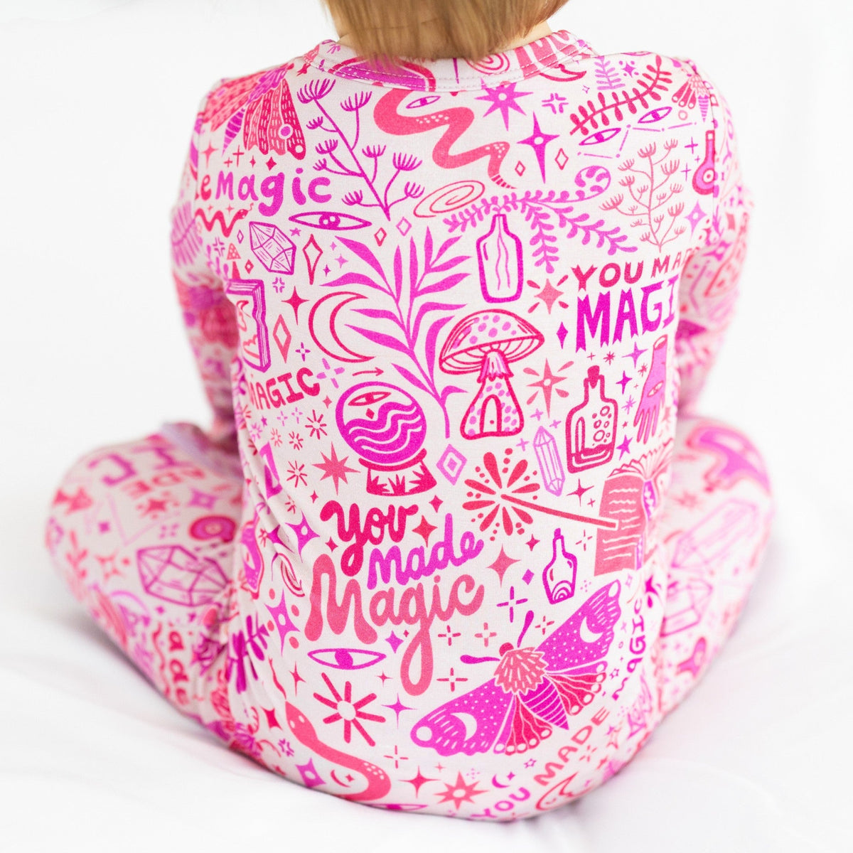 The Second-Skin Bamboo Zippered Footie | Mystic Mama with charming grips on the soles, preventing slips while allowing little ones to wiggle.
