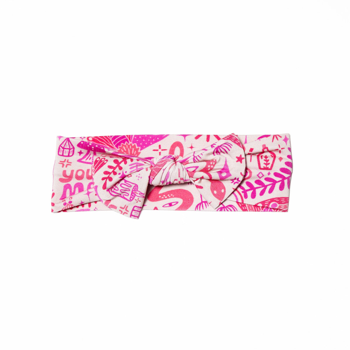 The SoftKnot Bow pink patterned bamboo headwrap with knot and CozyMa finish.