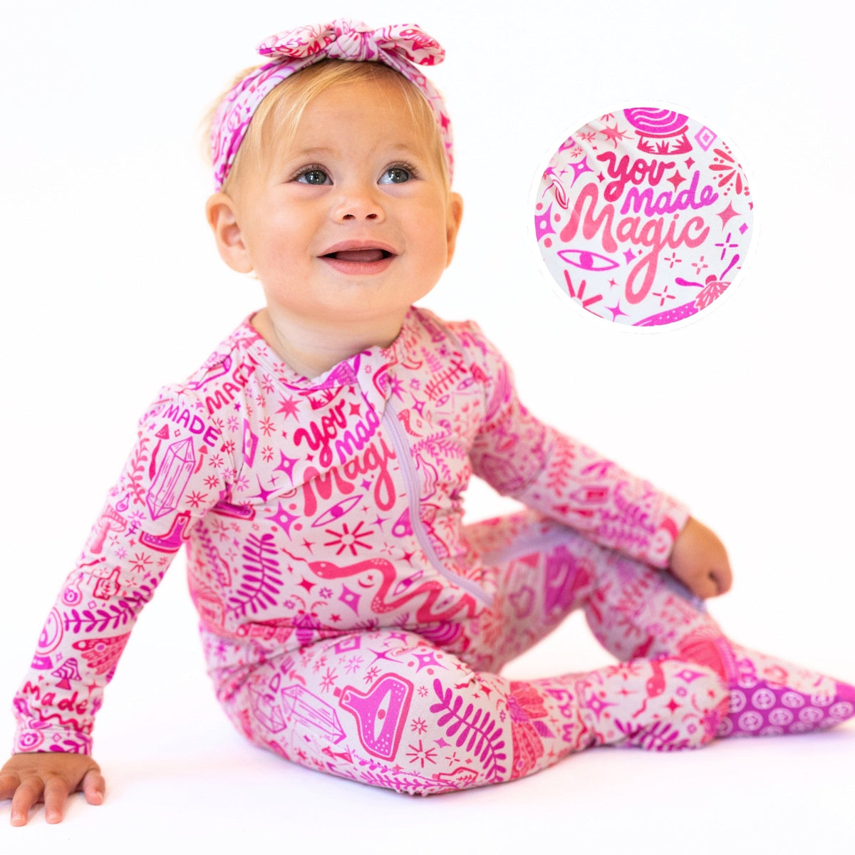 The Second-Skin Bamboo Zippered Footie | Mystic Mama in soft pink fabric, featuring gentle designs perfect for your little one.
