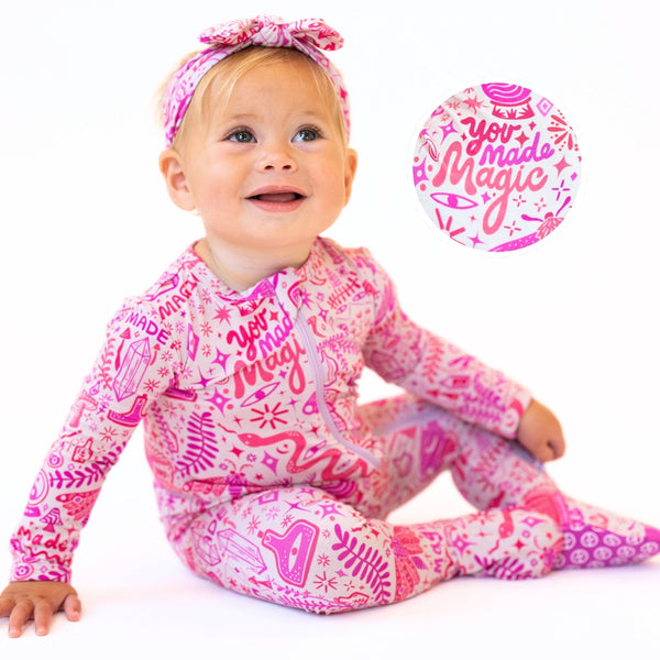 The Second-Skin Bamboo Zippered Footie | Mystic Mama in soft pink fabric, featuring gentle designs perfect for your little one.