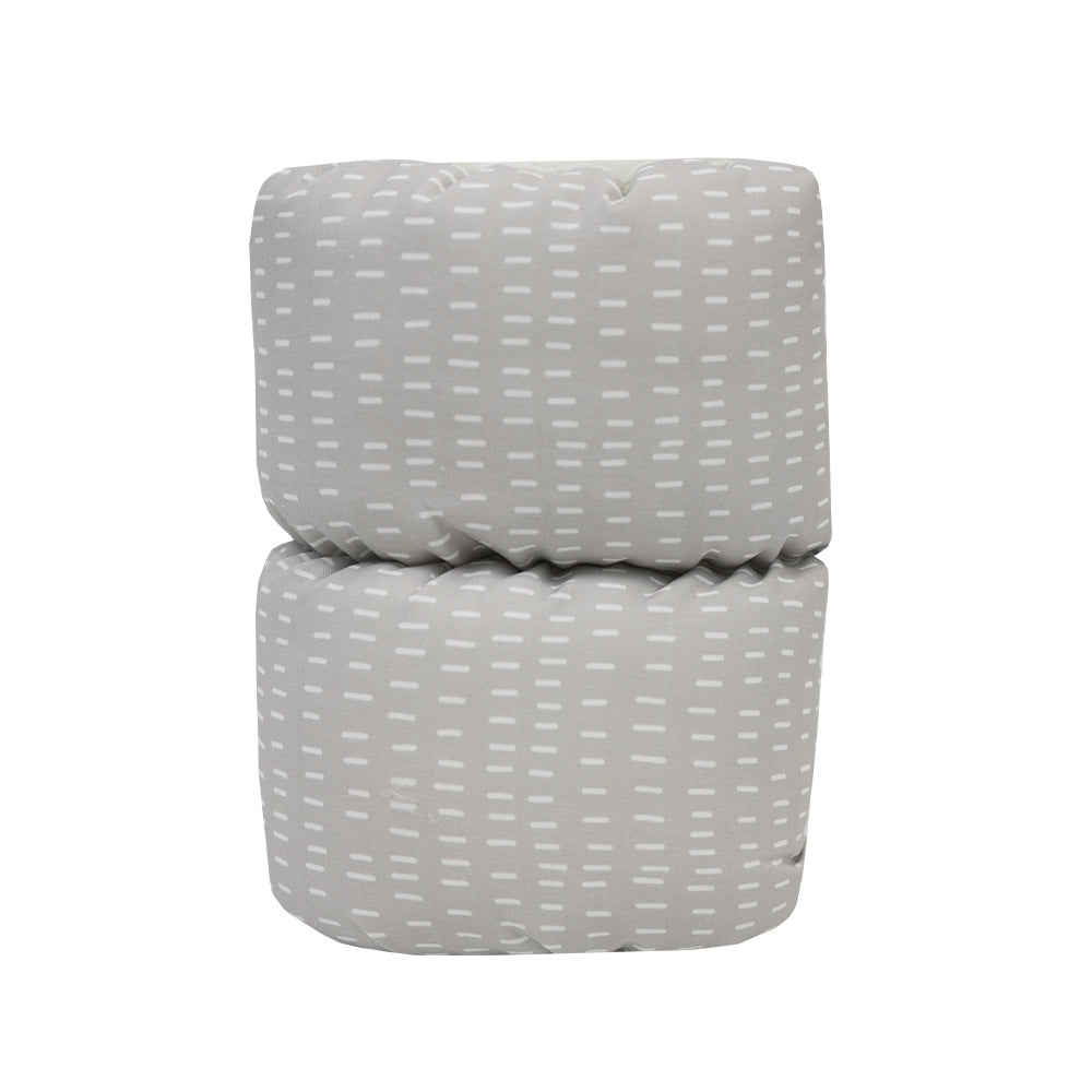 Oakley Comfy Cradle nursing arm pillow folded, showcasing its soft grey pattern for comfortable feeding.