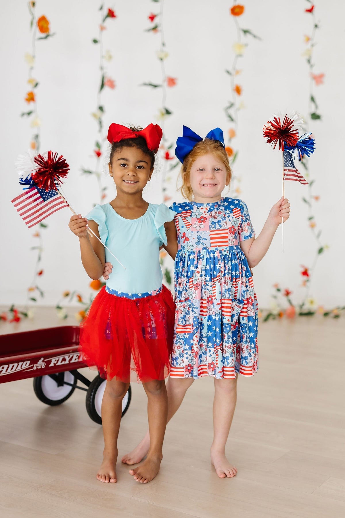 Girls patriotic pocket twirl dress with red white and blue colors and sparkly details for kids