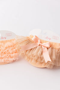 Peach & Gold Glitter Tutu Bloomers by Mila & Rose, showcasing playful ruffles and a sweet bow, ideal for special occasions.