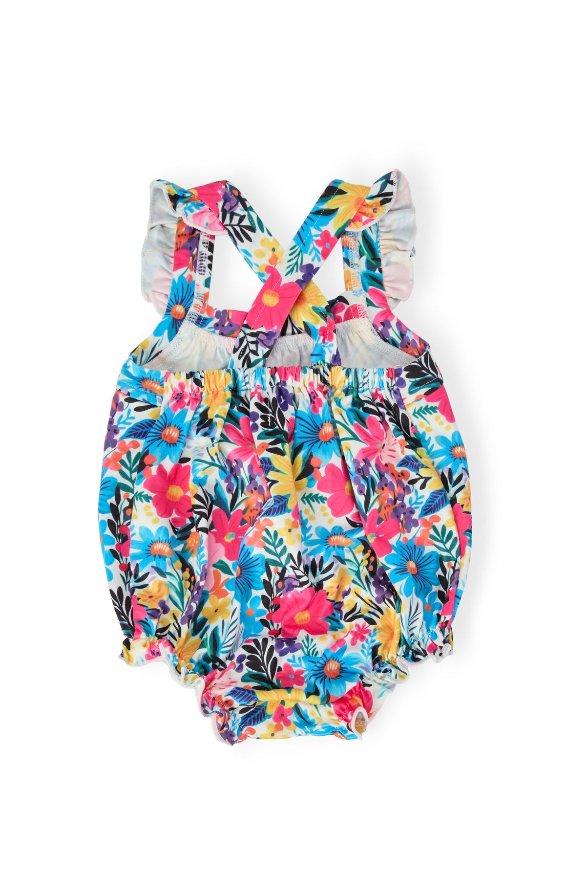 Petal Paradise Ruffle Cross Back Romper in a bright floral print with crisscross straps and ruffled shoulders.