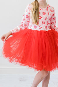 Pink peppermint long sleeve tutu dress with candy print bodice and fluffy red tulle skirt for twirling and play.