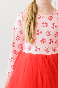 Pink peppermint long sleeve tutu dress featuring candy print top and bright red tulle skirt for girls.