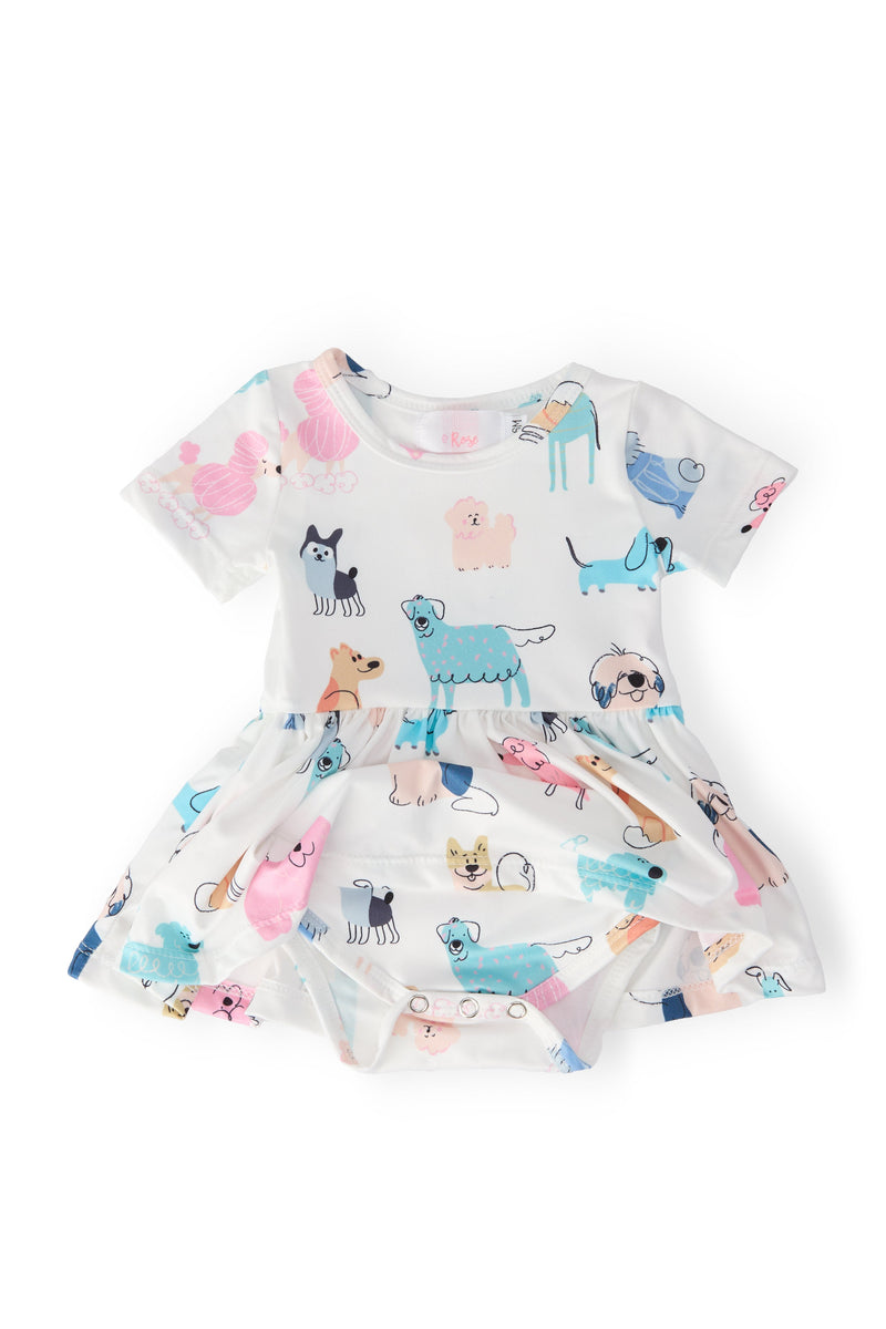 Puppy Pals Short Sleeve Twirl Bodysuit showcasing a twirl-friendly silhouette, delightfully decorated with cute dog illustrations, ideal for kids' playtime.