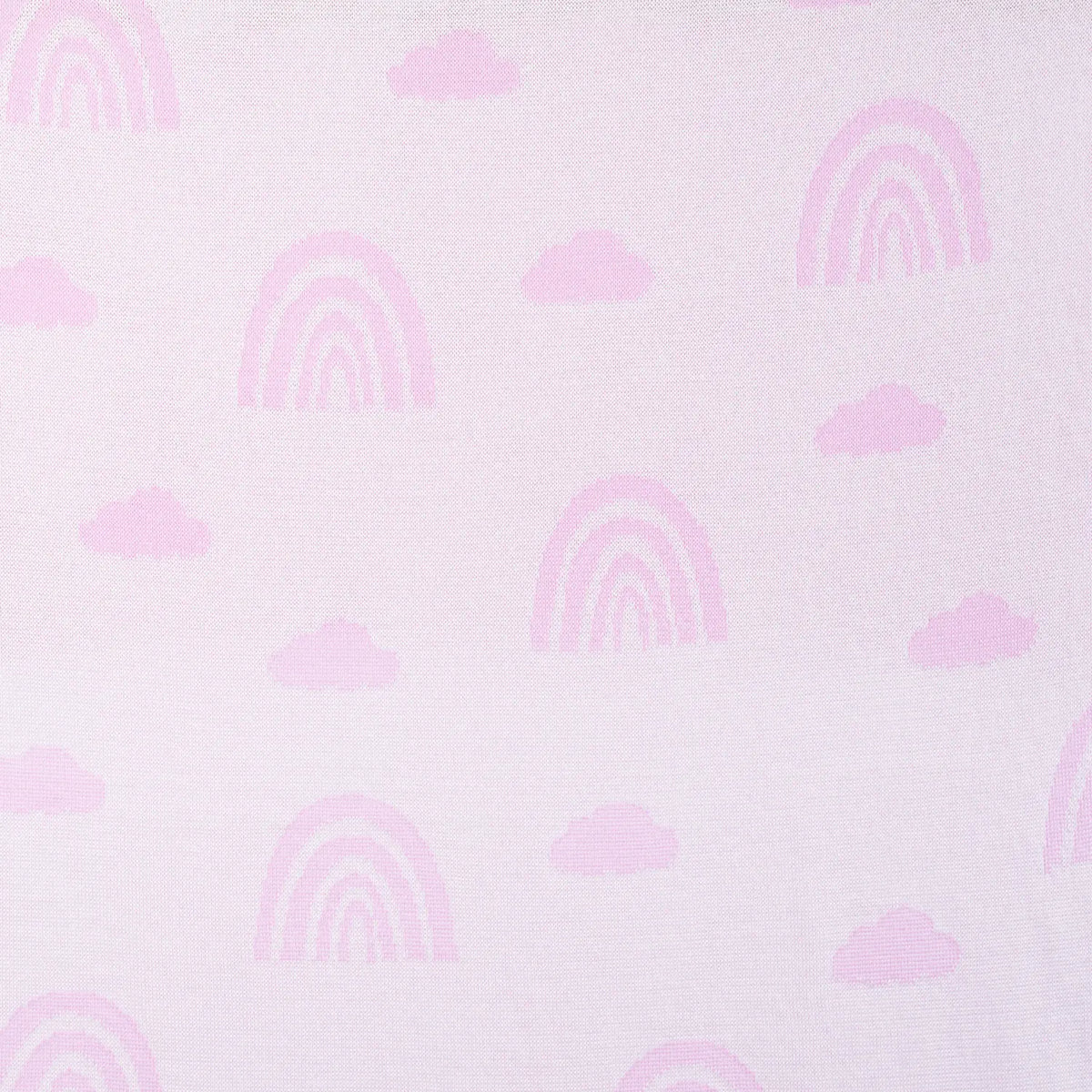 Macro shot of pastel pink background with lighter pink rainbow motifs blending into smooth jacquard weave surface