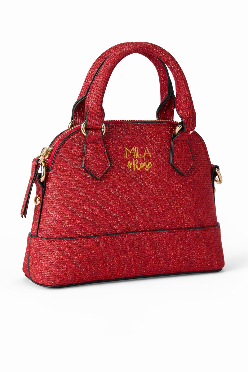 Glittery red girl's crossbody purse with gold hardware, top handle, and Mila & Rose logo embroidery.