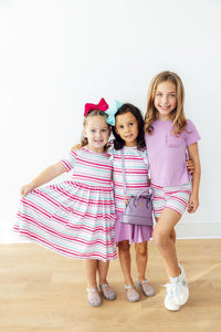 Close-up of the Pastel Stripes Short Sleeve Twirl Dress for Girls featuring pockets, ideal girls twirl dress for everyday wear.