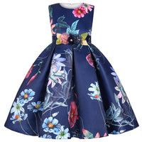 Navy sleeveless girls' dress with six-color tropical floral print, ruched waist flower belt, full pleated skirt.